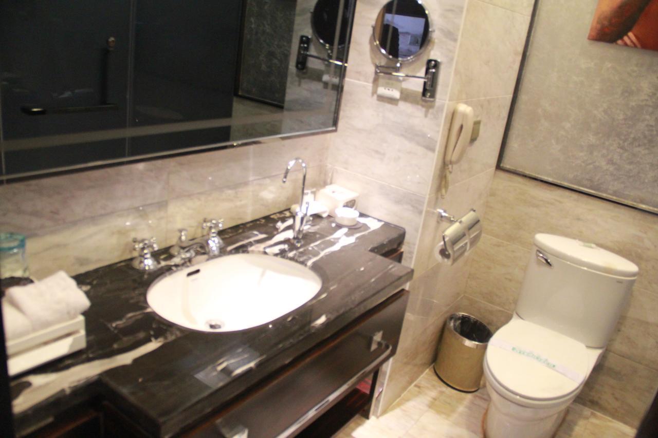 Huangjingang Holiday Hotel Jiexiu Room photo